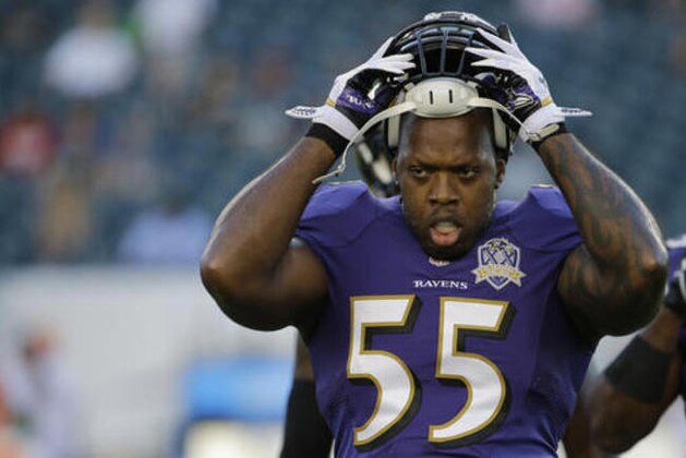 FILE - In this Aug. 22, 2015, file photo, Baltimore Ravens outside linebacker Terrell Suggs warms up before a preseason NFL football game against the Philadelphia Eagles, in Philadelphia. Suggs has returned to practice for the first time since tearing his left Achilles tendon last September. The six-time Pro Bowl selection participated in Monday's, Aug. 15, 2016, workout on a limited basis. (AP Photo/Matt Rourke, File)