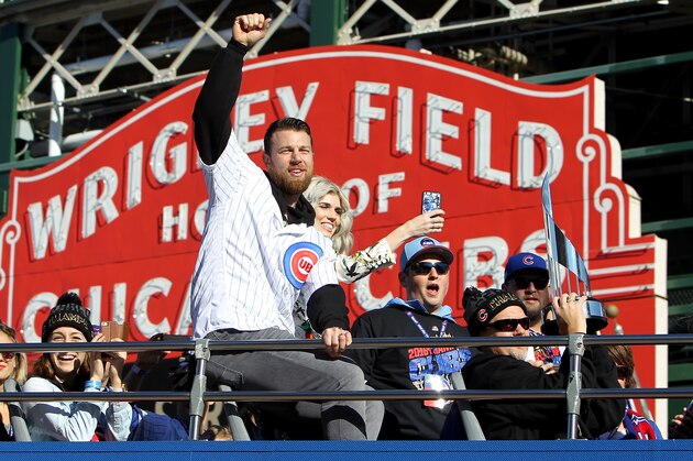 CHICAGO, IL - NOVEMBER 04:  Ben Zobrist #18 of the Chicago Cubs waves to the crowd during the 2016 World Series victory parade on November 4, 2016 in Chicago, Illinois. The Cubs won their first World Series championship in 108 years after defeating the Cleveland Indians 8-7 in Game 7. (Photo by Dylan Buell/Getty Images)
