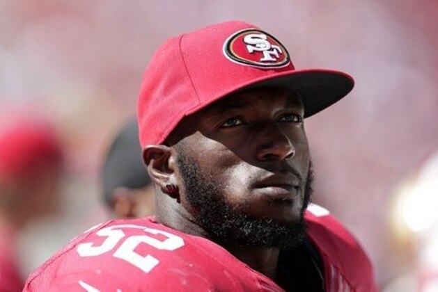 San Francisco 49ers linebacker Patrick Willis (52) stands on the sideline during the second half of an NFL preseason football game against the San Diego Chargers in Santa Clara, Calif., Sunday, Aug. 24, 2014. (AP Photo/Marcio Jose Sanchez)