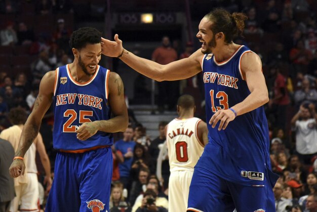 Nov 4, 2016; Chicago, IL, USA; New York Knicks center Joakim Noah (13) and New York Knicks guard Derrick Rose (25) celebrate during the second half at  the United Center. The Knicks won 117-104. Mandatory Credit: David Banks-USA TODAY Sports