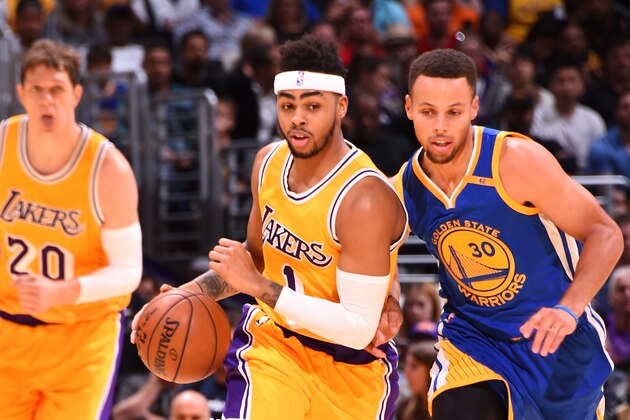 LOS ANGELES, CA - NOVEMBER 4:  D'Angelo Russell #1 of the Los Angeles Lakers handles the ball against the Stephen Curry #30 of the Golden State Warriorson November 4, 2016 at STAPLES Center in Los Angeles, California. NOTE TO USER: User expressly acknowledges and agrees that, by downloading and/or using this Photograph, user is consenting to the terms and conditions of the Getty Images License Agreement. Mandatory Copyright Notice: Copyright 2016 NBAE (Photo by Andrew D. Bernstein/NBAE via Getty Images)