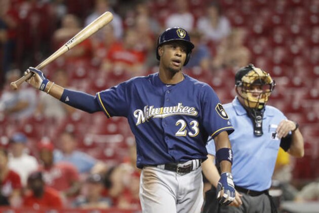 Milwaukee Brewers' Keon Broxton reacts after striking out against Cincinnati Reds relief pitcher Raisel Iglesias in the ninth inning of a baseball game, Monday, Sept. 12, 2016, in Cincinnati. The Reds won 3-0. (AP Photo/John Minchillo)