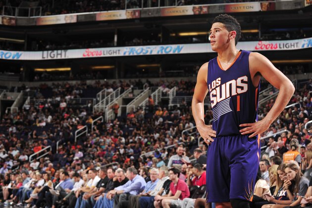 PHOENIX, AZ - NOVEMBER 2:  Devin Booker #1 of the Phoenix Suns reacts to a play against the Portland Trail Blazers on November 2, 2016 at Talking Stick Resort Arena in Phoenix, Arizona. NOTE TO USER: User expressly acknowledges and agrees that, by downloading and or using this photograph, user is consenting to the terms and conditions of the Getty Images License Agreement. Mandatory Copyright Notice: Copyright 2016 NBAE (Photo by Barry Gossage/NBAE via Getty Images)