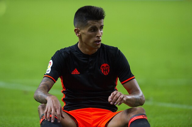 GIJON, SPAIN - OCTOBER 16:  Joao Cancelo of Valencia CF reacts during the La Liga match between Real Sporting de Gijon and Valencia CF at Estadio El Molinon on October 16, 2016 in Gijon, Spain.  (Photo by Juan Manuel Serrano Arce/Getty Images)