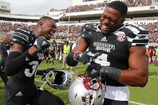 STARKVILLE, MS - NOVEMBER 5:  Defensive back Chris Stamps #30 of the Mississippi State Bulldogs celebrates with linebacker Gerri Green #4 of the Mississippi State Bulldogs after the end of an NCAA college football game at Davis Wade Stadium on November 5, 2016 in Starkville, Mississippi. Mississippi State beat the Texas A&M Aggies 35-28. (Photo by Butch Dill/Getty Images)