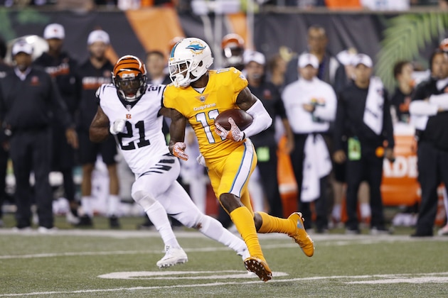 CINCINNATI, OH - SEPTEMBER 29: DeVante Parker #11 of the Miami Dolphins runs after a reception against Darqueze Dennard #21 of the Cincinnati Bengals during the game at Paul Brown Stadium on September 29, 2016 in Cincinnati, Ohio. The Bengals defeated the Dolphins 22-7. (Photo by Joe Robbins/Getty Images)