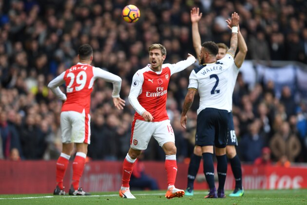 LONDON, ENGLAND - NOVEMBER 06:  Nacho Monreal of Arsenal and Kyle Walker of Tottenham Hotspur appeal to the referee during the Premier League match between Arsenal and Tottenham Hotspur at Emirates Stadium on November 6, 2016 in London, England.  (Photo by Shaun Botterill/Getty Images)