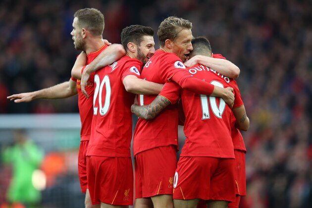 LIVERPOOL, ENGLAND - NOVEMBER 06:  Philippe Coutinho of Liverpool celebrates scoring his sides second goal with team mates during the Premier League match between Liverpool and Watford at Anfield on November 6, 2016 in Liverpool, England.  (Photo by Clive Brunskill/Getty Images)