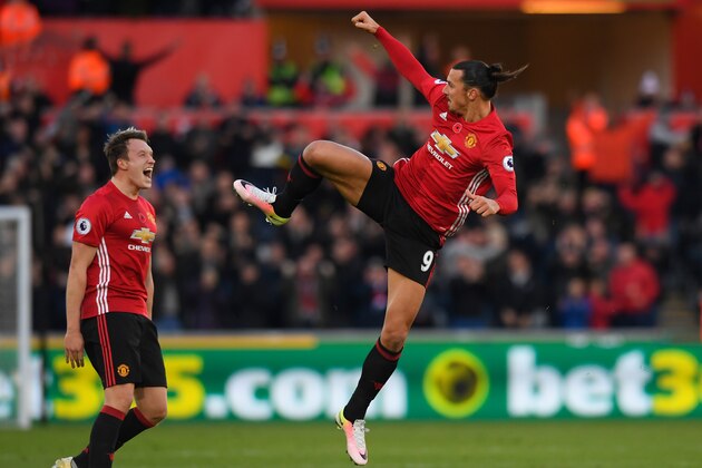 SWANSEA, WALES - NOVEMBER 06:  Zlatan Ibrahimovic of Manchester United celebrates scoring his sides second goal with Phil Jones of Manchester United during the Premier League match between Swansea City and Manchester United at Liberty Stadium on November 6, 2016 in Swansea, Wales.  (Photo by Stu Forster/Getty Images)