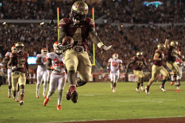 TALLAHASSEE, FL - OCTOBER 29:  Dalvin Cook #4 of the Florida State Seminoles celebrates a touchdown during a game against the Clemson Tigers at Doak Campbell Stadium on October 29, 2016 in Tallahassee, Florida.  (Photo by Mike Ehrmann/Getty Images)