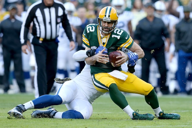 GREEN BAY, WI - NOVEMBER 06:  Lavar Edwards #95 of the Indianapolis Colts sacks Aaron Rodgers #12 of the Green Bay Packers in the first quarter at Lambeau Field on November 6, 2016 in Green Bay, Wisconsin. (Photo by Dylan Buell/Getty Images)