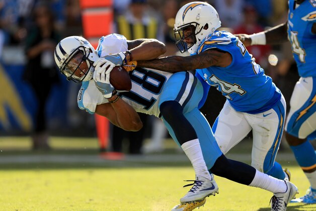 SAN DIEGO, CA - NOVEMBER 06:  Rishard Matthews #18 of the Tennessee Titans scores in the first half as Brandon Flowers #24 of the San Diego Chargers  can't keep him from the end zone at Qualcomm Stadium on November 6, 2016 in San Diego, California.  (Photo by Sean M. Haffey/Getty Images)