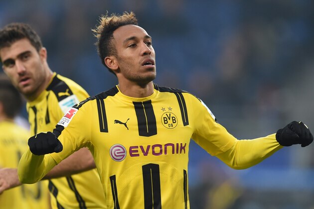 Pierre-Emerick Aubameyang from Dortmund celebrates his fourth goal to the 0:4 during the German first division Bundesliga football match between Hamburg SV and BVB Borussia Dortmund in Hamburg, northern Germany, on November 5, 2016.  / AFP / CARMEN JASPERSEN / RESTRICTIONS: DURING MATCH TIME: DFL RULES TO LIMIT THE ONLINE USAGE TO 15 PICTURES PER MATCH AND FORBID IMAGE SEQUENCES TO SIMULATE VIDEO. == RESTRICTED TO EDITORIAL USE == FOR FURTHER QUERIES PLEASE CONTACT DFL DIRECTLY AT + 49 69 650050
 / ALTERNATIVE CROP        (Photo credit should read CARMEN JASPERSEN/AFP/Getty Images)