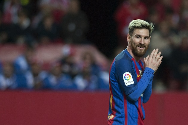 Barcelona's Argentinian forward Lionel Messi looks on during the Spanish league football match Sevilla FC vs FC Barcelona at the Ramon Sanchez Pizjuan stadium in Sevilla on November 6, 2016. / AFP / JORGE GUERRERO        (Photo credit should read JORGE GUERRERO/AFP/Getty Images)
