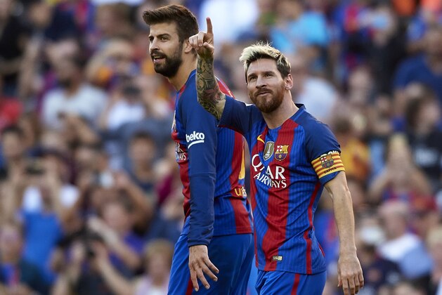 BARCELONA, SPAIN - OCTOBER 15:  Lionel Messi of FC Barcelona celebrates scoring his team's fourth goal with his teammate Gerard Pique during the La Liga match between FC Barcelona and RC Deportivo de La Coruna at Camp Nou stadium on October 15, 2016 in Barcelona, Spain.  (Photo by Manuel Queimadelos Alonso/Getty Images)
