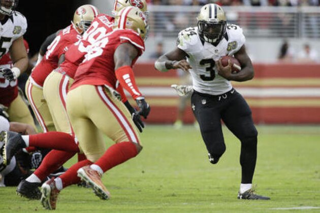 New Orleans Saints running back Tim Hightower runs the ball during the first half of an NFL football game against the San Francisco 49ers Sunday, Nov. 6, 2016, in Santa Clara, Calif. (AP Photo/Tony Avelar)