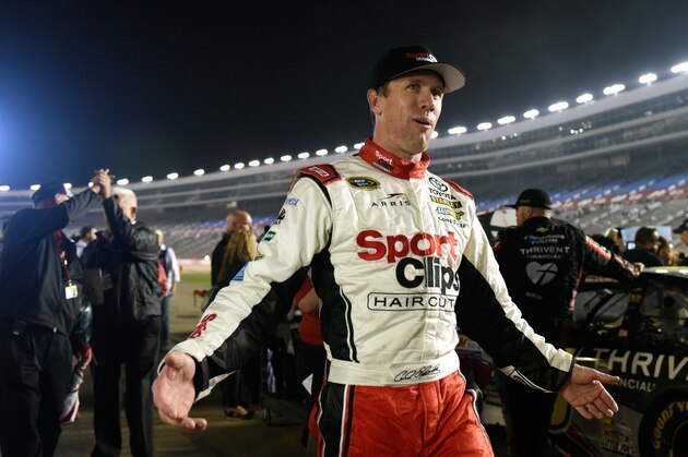 FORT WORTH, TX - NOVEMBER 06:  Carl Edwards, driver of the #19 Sport Clips Toyota, reacts to winning the rain-shortened NASCAR Sprint Cup Series AAA Texas 500 at Texas Motor Speedway on November 6, 2016 in Fort Worth, Texas.  (Photo by Jared C. Tilton/Getty Images)