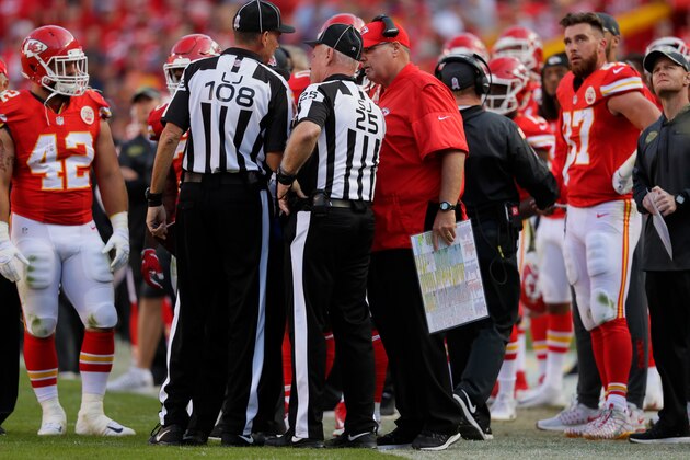 KANSAS CITY, MO - NOVEMBER 6: Tight end Travis Kelce #87 of the Kansas City Chiefs stands on the sidelines while head coach Andy Reid discusses the play with officials after Kelsey was ejected on a play against the Jacksonville Jaguars at Arrowhead Stadium during the fourth quarter of the game on November 6, 2016 in Kansas City, Missouri. (Photo by Jamie Squire/Getty Images)