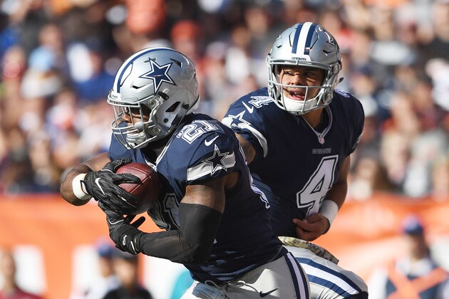 CLEVELAND, OH - NOVEMBER 06:  Ezekiel Elliott #21 of the Dallas Cowboys takes a hand off in the second half from Dak Prescott #4 against the Cleveland Browns at FirstEnergy Stadium on November 6, 2016 in Cleveland, Ohio.  (Photo by Jason Miller/Getty Images)