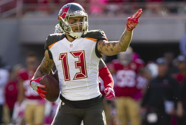 Oct 23, 2016; Santa Clara, CA, USA; Tampa Bay Buccaneers wide receiver Mike Evans (13) gestures after a catch against the San Francisco 49ers during the third quarter at Levi's Stadium. The  Tampa Bay Buccaneers defeated the San Francisco 49ers 34-17. Mandatory Credit: Kelley L Cox-USA TODAY Sports