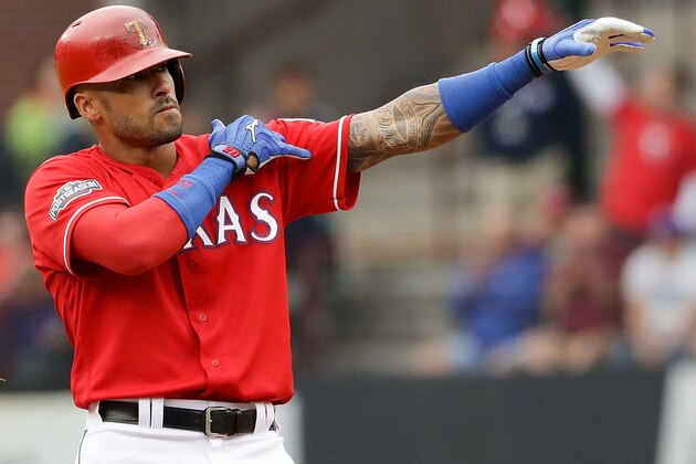 ARLINGTON, TX - OCTOBER 07:  Ian Desmond #20 of the Texas Rangers reacts after hitting a double against the Toronto Blue Jays in the seventh inning of game two of the American League Divison Series at Globe Life Park in Arlington on October 7, 2016 in Arlington, Texas.  (Photo by Ronald Martinez/Getty Images)