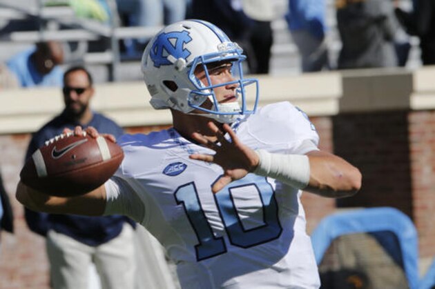North Carolina quarterback Mitch Trubisky (10) warms up prior to the start of an NCAA college football game between North Carolina and Virginia at Scott stadium in Charlottesville, Va., Saturday, Oct. 22, 2016. (AP Photo/Steve Helber)