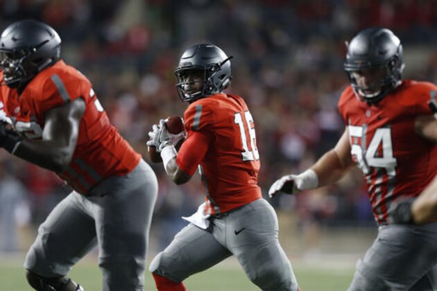 Ohio State quarterback J.T. Barrett plays against Nebraska during an NCAA college football game Saturday, Nov. 5, 2016, in Columbus, Ohio. (AP Photo/Jay LaPrete)