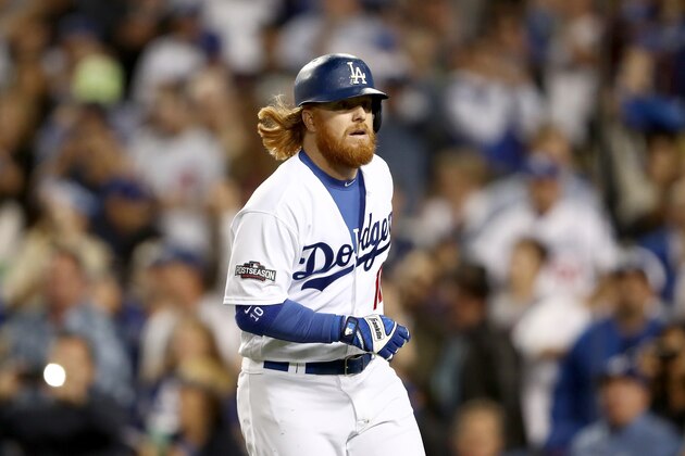 LOS ANGELES, CA - OCTOBER 18:  Justin Turner #10 of the Los Angeles Dodgers celebrates after he hits a solo home run in the sixth inning against the Chicago Cubs in game three of the National League Championship Series at Dodger Stadium on October 18, 2016 in Los Angeles, California.  (Photo by Sean M. Haffey/Getty Images)