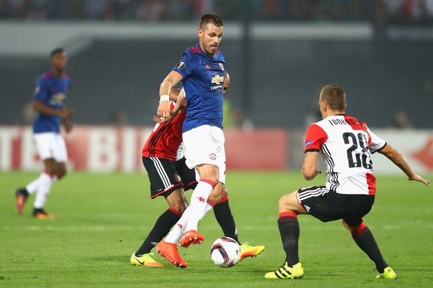ROTTERDAM, NETHERLANDS - SEPTEMBER 15:  Morgan Schneiderlin of Manchester United is put under pressure by Karim El Ahmadi and Jens Toornstra of Feyenoord during the UEFA Europa League Group A match between Feyenoord and Manchester United FC at Feijenoord Stadion on September 15, 2016 in Rotterdam, .  (Photo by Dean Mouhtaropoulos/Getty Images)