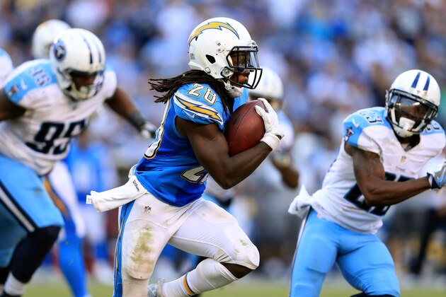 SAN DIEGO, CA - NOVEMBER 06:   Melvin Gordon #28 of the San Diego Chargers runs with the ball as Jurrell Casey #99 of the Tennessee Titans chases during the second half of a game at Qualcomm Stadium on November 6, 2016 in San Diego, California.  (Photo by Sean M. Haffey/Getty Images)