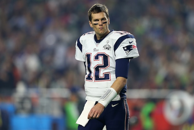 GLENDALE, AZ - FEBRUARY 01:  Tom Brady #12 of the New England Patriots reacts against the Seattle Seahawks during Super Bowl XLIX at University of Phoenix Stadium on February 1, 2015 in Glendale, Arizona.  (Photo by Elsa/Getty Images)