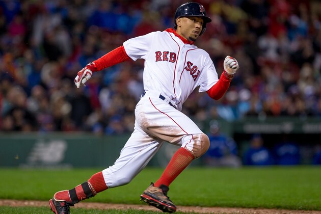 BOSTON, MA - OCTOBER 1: Mookie Betts #50 of the Boston Red Sox doubles to right field against the Toronto Blue Jays during the eighth inning at Fenway Park on October 1, 2016 in Boston, Massachusetts. The Blue Jays won 4-3. (Photo by Rich Gagnon/Getty Images)