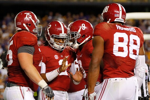 BATON ROUGE, LA - NOVEMBER 05:  Jalen Hurts #2 of the Alabama Crimson Tide reacts after scoring a touchdown against the LSU Tigers with Bradley Bozeman #75, Bo Scarbrough #9 and O.J. Howard #88 at Tiger Stadium on November 5, 2016 in Baton Rouge, Louisiana.  (Photo by Kevin C. Cox/Getty Images)