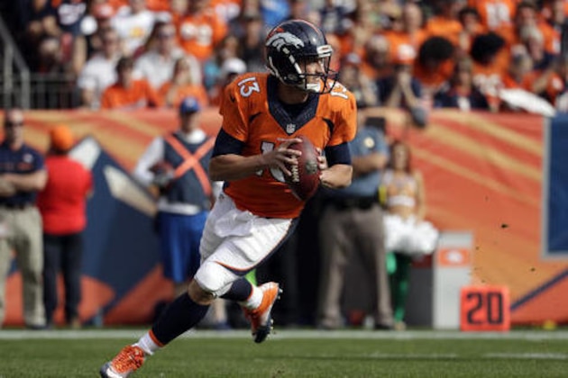 FILE - In this Oct. 30, 2016, file photo, Denver Broncos quarterback Trevor Siemian looks to pass during an NFL football game against the San Diego Chargers, in Denver. Siemian, the 250th overall draft pick in 2015, outdueled a trio of top overall selections in Cam Newton, Andrew Luck and Jameis Winston during a magnificent first month as Peyton Manning's surprise successor. Then, reality hit _ along with Buccaneers defensive tackle Clinton McDonald.(AP Photo/Jack Dempsey, File)