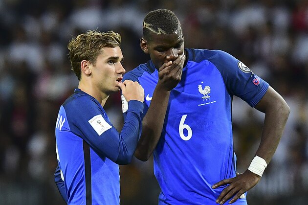 France's forward Antoine Griezmann (L) speaks with France's midfielder Paul Pogba during the FIFA World Cup 2018 qualifying football match Belarus vs France on September 6, 2016 at the Borisov Arena in Borisov.   / AFP / FRANCK FIFE        (Photo credit should read FRANCK FIFE/AFP/Getty Images)