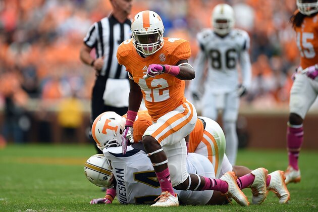 KNOXVILLE, TN - OCTOBER 11:  Chris Weatherd #42 of the Tennessee Volunteers reacts after a sack of Jacob Huesman #14 of the Chattanooga Mocs during the first quarter of a game at Neyland Stadium on October 11, 2014 in Knoxville, Tennessee.  Tennessee won the game 45-10.  (Photo by Stacy Revere/Getty Images)