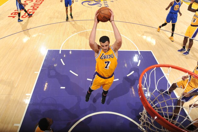 LOS ANGELES, CA - NOVEMBER 4: Larry Nance Jr. #7 of the Los Angeles Lakers grabs the rebound against the Golden State Warriors on November 4, 2016 at STAPLES Center in Los Angeles, California. NOTE TO USER: User expressly acknowledges and agrees that, by downloading and/or using this Photograph, user is consenting to the terms and conditions of the Getty Images License Agreement. Mandatory Copyright Notice: Copyright 2016 NBAE (Photo by Andrew D. Bernstein/NBAE via Getty Images)