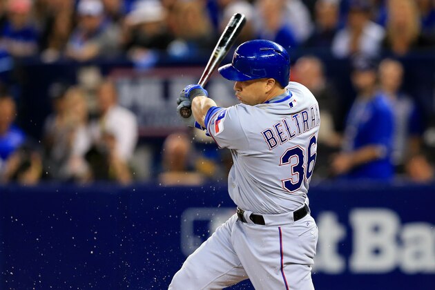 TORONTO, ON - OCTOBER 9: Carlos Beltran #36 of the Texas Rangers hits an RBI against the Toronto Blue Jays in the first inning during game three of the American League Division Series at Rogers Centre on October 9, 2016 in Toronto, Canada. (Photo by Vaughn Ridley/Getty Images)