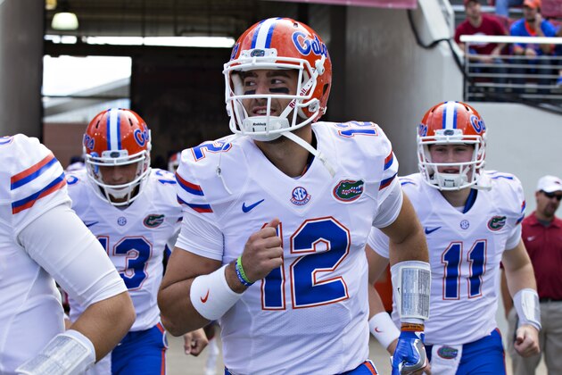 FAYETTEVILLE, AR - NOVEMBER 5:  Austin Appleby #12 of the Florida Gators jogs onto the field before a game against the Arkansas Razorbacks at Razorback Stadium on November 5, 2016 in Fayetteville, Arkansas.  The Razorbacks defeated the Gators 31-10.  (Photo by Wesley Hitt/Getty Images)