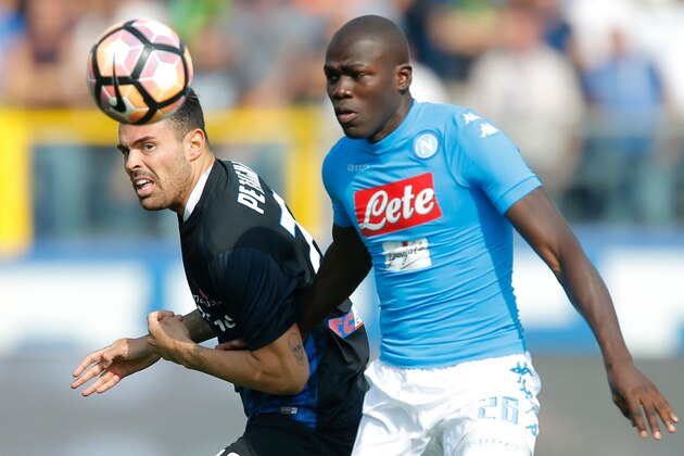 Napoli's defender from France Kalidou Koulibaly (R) vies with Atalanta's forward Andrea Petagna during the Italian Serie A football match Atalanta vs Napoli on October 2, 2016 in Bergamo. / AFP / Marco BERTORELLO        (Photo credit should read MARCO BERTORELLO/AFP/Getty Images)