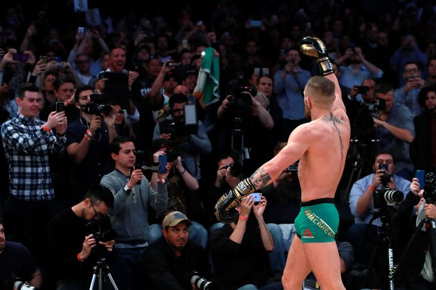 NEW YORK, NY - NOVEMBER 09:  UFC Featherweight Champion Conor McGregor motions to the crowd during UFC 205 Open Workouts at Madison Square Garden on November 9, 2016 in New York City.  (Photo by Michael Reaves/Getty Images)