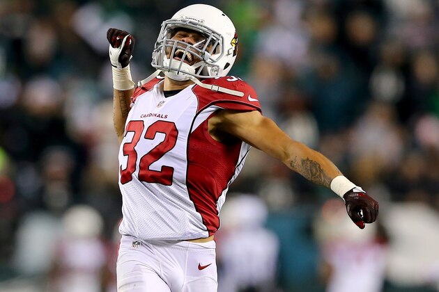 PHILADELPHIA, PA - DECEMBER 20:  Tyrann Mathieu #32 of the Arizona Cardinals celebrates after teamamte  Deone Bucannon picked off a pass from Sam Bradford of the Philadelphia Eagles and ran it in for a touchdown in the fourth quarter at Lincoln Financial Field on December 20, 2015 in Philadelphia, Pennsylvania.The Arizona Cardinals defeated the Philadelphia Eagles 40-17.  (Photo by Elsa/Getty Images)