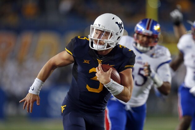MORGANTOWN, WV - NOVEMBER 05:  Skyler Howard #3 of the West Virginia Mountaineers rushes for a 22 yard touchdown in the first half against the Kansas Jayhawks during the game on November 5, 2016 at Mountaineer Field in Morgantown, West Virginia.  (Photo by Justin K. Aller/Getty Images)