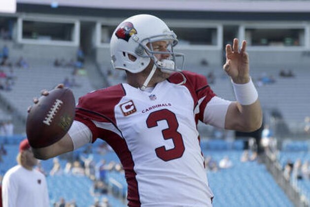 Arizona Cardinals' Carson Palmer (3) prepares to make a throw before the start of an NFL football game against the Carolina Panthers in Charlotte, N.C., Sunday, Oct. 30, 2016. The Panthers won 30-20. (AP Photo/Bob Leverone)