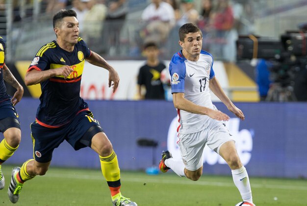 Jun 3, 2016; Santa Clara, CA, USA; United States midfielder Christian Pulisic (17) dribbles the ball ahead of Colombia defender Stefan Medina (14) in the second half during the group play stage of the 2016 Copa America Centenario at Levi's Stadium. Colombia won 2-0. Mandatory Credit: Kelley L Cox-USA TODAY Sports