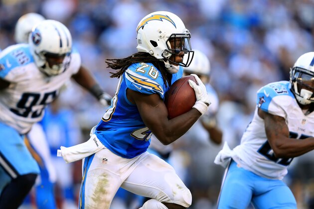 SAN DIEGO, CA - NOVEMBER 06:   Melvin Gordon #28 of the San Diego Chargers runs with the ball as Jurrell Casey #99 of the Tennessee Titans chases during the second half of a game at Qualcomm Stadium on November 6, 2016 in San Diego, California.  (Photo by Sean M. Haffey/Getty Images)
