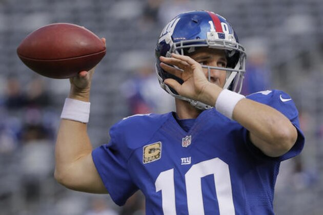 New York Giants quarterback Eli Manning (10) warms up before playing against the Philadelphia Eagles in an NFL football game, Sunday, Nov. 6, 2016, in East Rutherford, N.J. (AP Photo/Frank Franklin II)