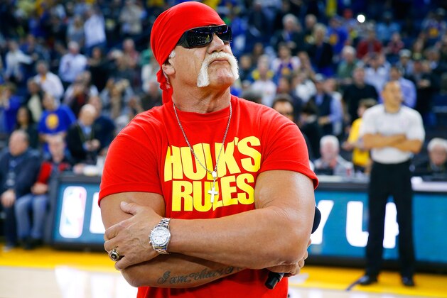 OAKLAND, CA - NOVEMBER 13:  Hulk Hogan pumps of the Warriors fans before the start of an NBA basketball game between the Brooklyn Nets and the Golden State Warriors at ORACLE Arena on November 13, 2014 in Oakland, California. NOTE TO USER: User expressly acknowledges and agrees that, by downloading and or using this photograph, User is consenting to the terms and conditions of the Getty Images License Agreement.  (Photo by Thearon W. Henderson/Getty Images)
