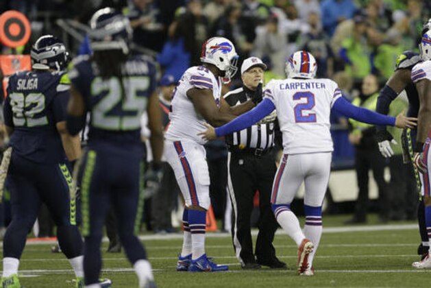 FILE - In this Monday, Nov. 7, 2016, file photo, Buffalo Bills kicker Dan Carpenter (2) complains to referee Walt Anderson late in the first half of an NFL football game against the Seattle Seahawks, in Seattle. Richard Sherman spent last week criticizing what he believed were incorrect calls, only to be at the center of another officiating flap Monday night that this time went Seattle's way. (AP Photo/John Froschauer, File)