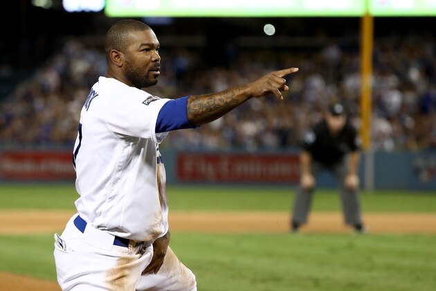 LOS ANGELES, CA - OCTOBER 20:  Howie Kendrick #47 of the Los Angeles Dodgers calls for a replay after stealing third base against the Chicago Cubs in game five of the National League Division Series at Dodger Stadium on October 20, 2016 in Los Angeles, California.  (Photo by Sean M. Haffey/Getty Images)